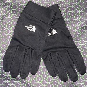 unisex L north face gloves.